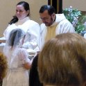 Receiving her own copy of the Gospel